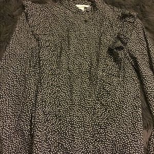 Black floral button up with ruffles.